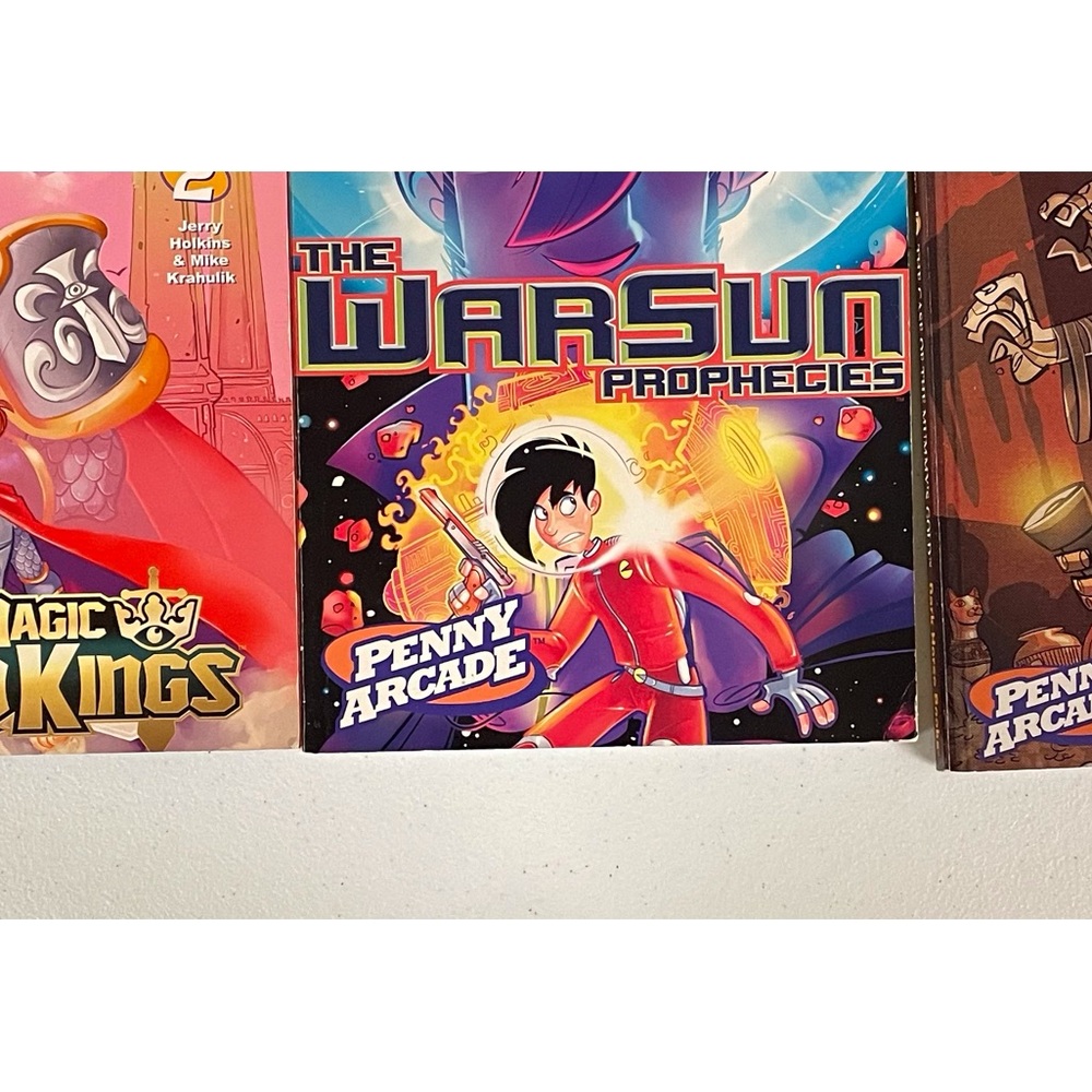 3 Penny Arcade Comics/Graphic Novels - Mummy’s Gold, Sword Kings, WarSun Prop.